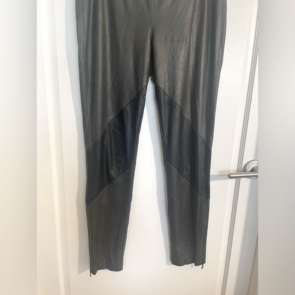 Green and black leather leggings